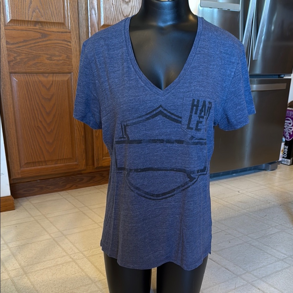 Harley Davidson women’s v-neck, pocket t-shirt. 
Size medium